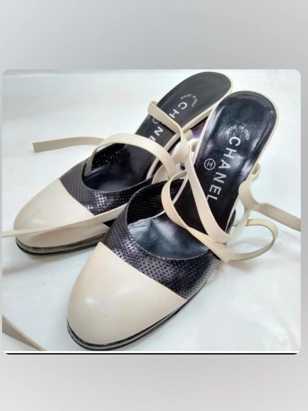 CHANEL Two-Tone Cream and Black Perforated Slingback Mules